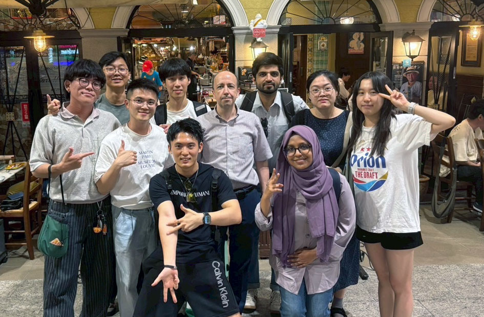 Lab members together at a restaurant on SusMatLab Day